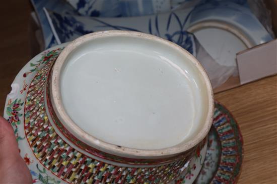 A Chinese famille rose basket and stand and a blue and white bowl, both a.f.